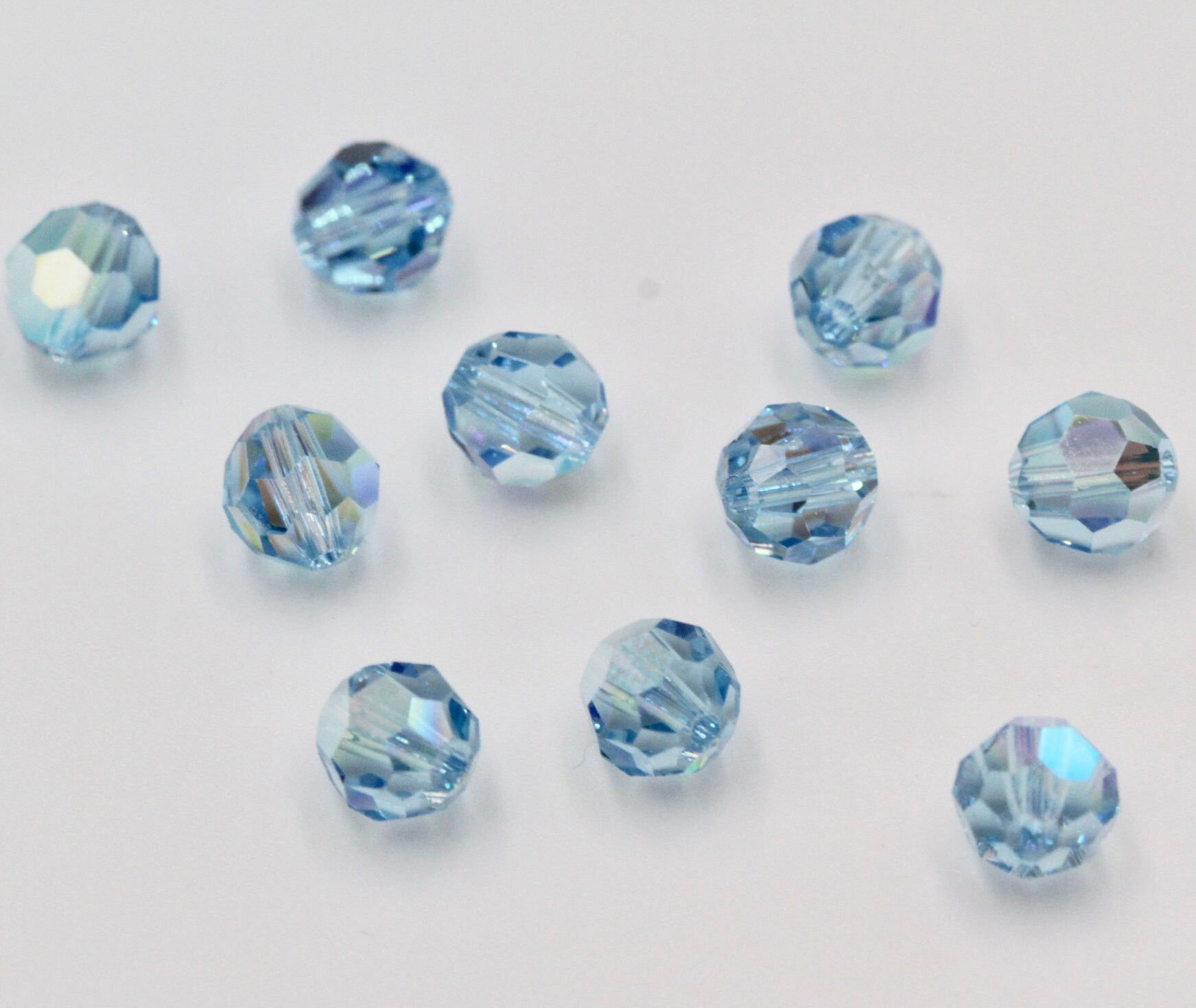 6 mm 純正スワロフスキー® 5000 ラウンドビーズ アクアマリン 202 AB 
