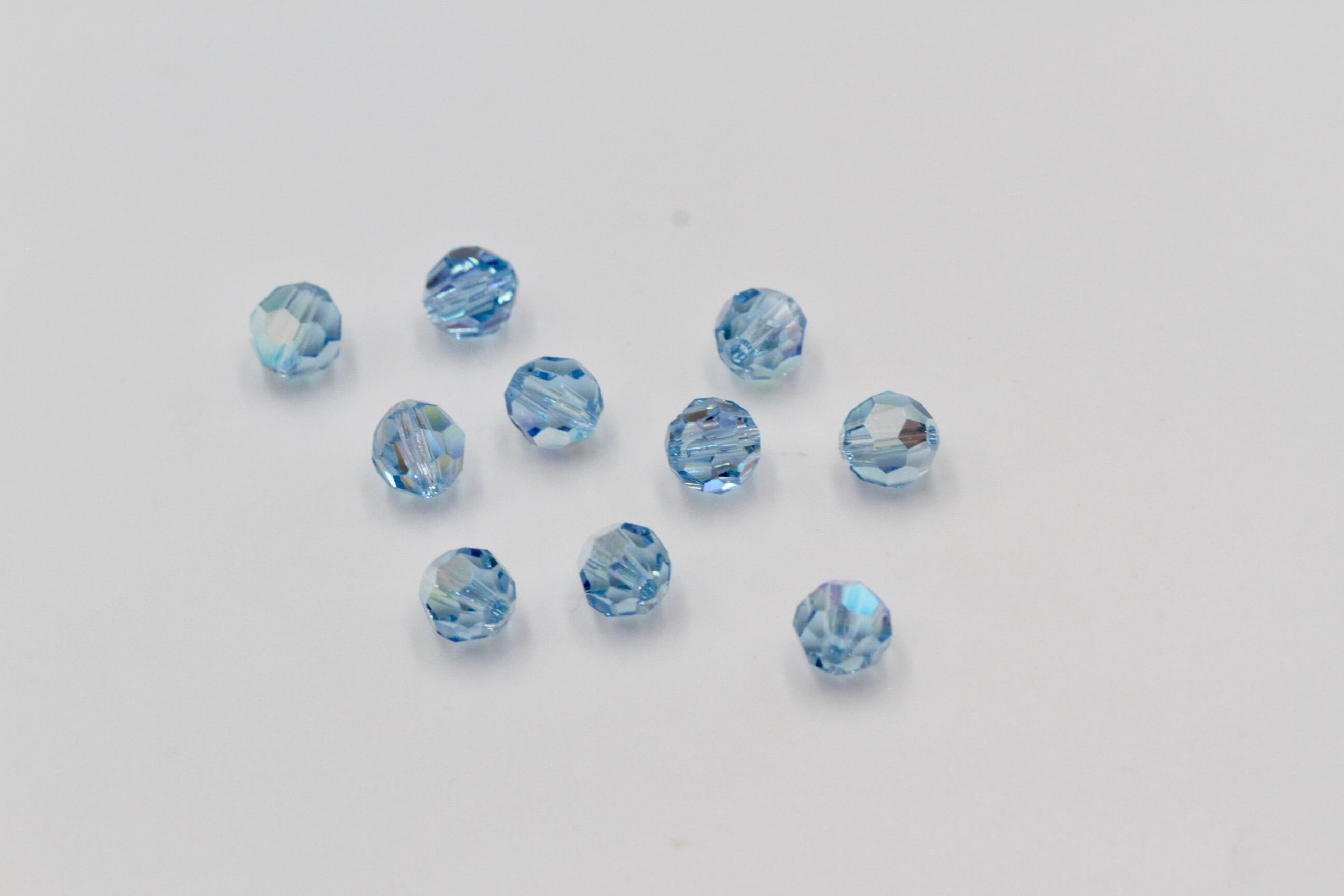 6 mm 純正スワロフスキー® 5000 ラウンドビーズ アクアマリン 202 AB 