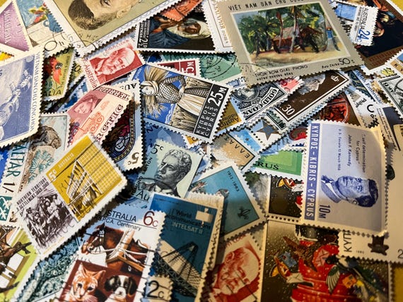 100 x Mixed Vintage World Stamps.