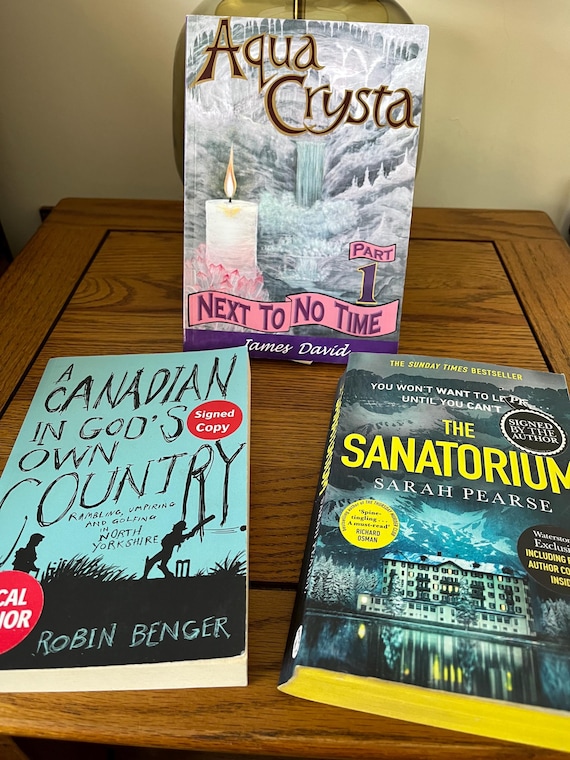 Signed Book Collection, Aqua Chrystal Next To No Time ( James David), A Canadian In God’s Own Countey ( Robin Benger), The Sanatorium.