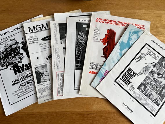 Collection Of Original Movie Cinema Exhibitors Campaign Books Including West Side Story.