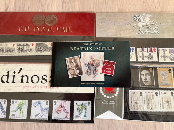 Collection Of Mint Royal Mail Stamps Including Beatrix Potter, Gallantry, Dinosaurs, Royal Mail, Investiture Of The Prince Of Wales.