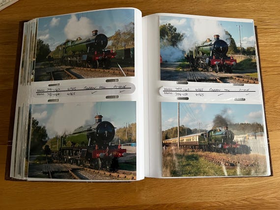 Suede Album Containing Several 100 Photographs Relating To Trains.