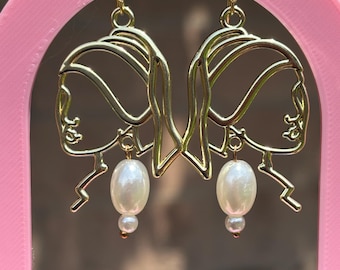 Brincos de ouro e pérolas: joias artísticas penduradas