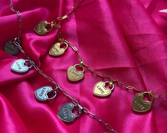 Colar Cadeado do Amor: colar com pingente, banhado a ouro e prata.