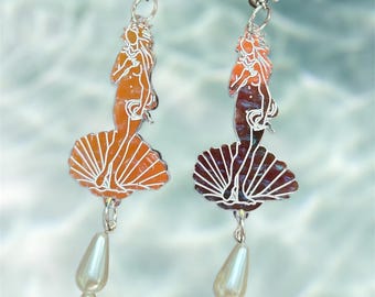 Brincos de acrílico: joias iridescentes inspiradas em Afrodite