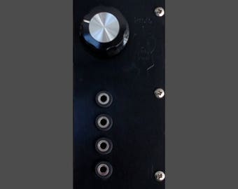 May include: Black metal panel with a knob and four jacks. The knob is black with a silver center. The jacks are arranged vertically.