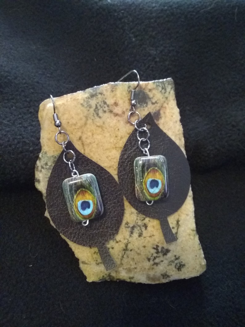 Peacock feathers bead over Black faux Leather Leaf Earrings