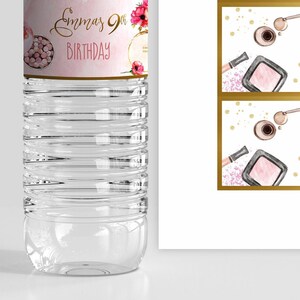 May include: Water bottle label with a pink and gold design featuring makeup brushes, blush, and the text "Emma's 9th Birthday".