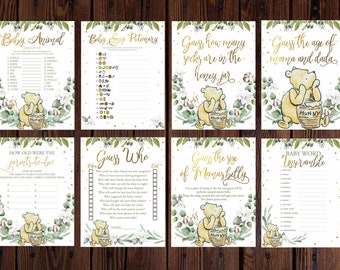 May include: A set of ten printable baby shower game cards featuring Winnie the Pooh and honey pot illustrations. The games include "Baby Animal Match Up", "Baby Eyesictionary", "Guess How Many Socks Are In The Honey Jar", "Guess The Age Of Mama And Dada", "How Old Were The Parents-To-Be", "Guess Who", "Guess The Size Of Mama's Belly", and "Baby Word Unscramble".