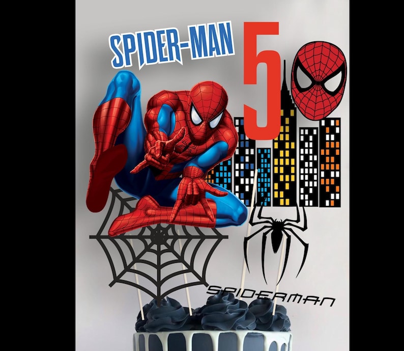 May include: Spider-Man cake topper featuring a red and blue Spider-Man figure, a black spider web, a black spider, and a cityscape with the number 5. The text "Spider-Man" is written in red letters.