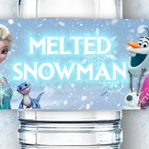 May include: A blue and white water bottle label with a winter theme. The label features the characters Elsa and Olaf from the movie Frozen, along with a small blue lizard. The text on the label reads "MELTED SNOWMAN".