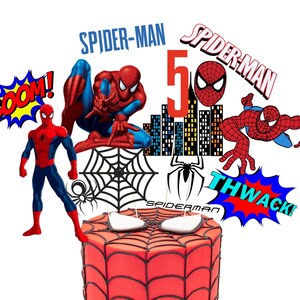 May include: Spider-Man themed cake topper set featuring a red and blue Spider-Man character, a web, a red and blue "BOOM!" speech bubble, a red and blue "THWACK!" speech bubble, a red and blue Spider-Man character with the number 5, and a red and blue Spider-Man character with the text "SPIDER-MAN".