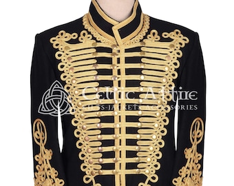 May include: A black jacket with gold braid trim and buttons. The jacket has a stand-up collar and long sleeves. The braid trim is in a decorative pattern on the front and sleeves.