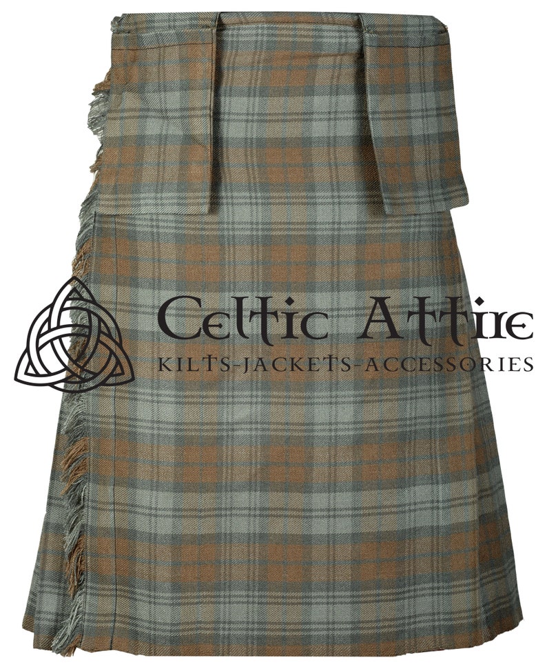 May include: A traditional kilt with a brown and green plaid pattern. The kilt has a fringed bottom and is made of a woven fabric. The kilt is a traditional garment worn by men in Scotland.