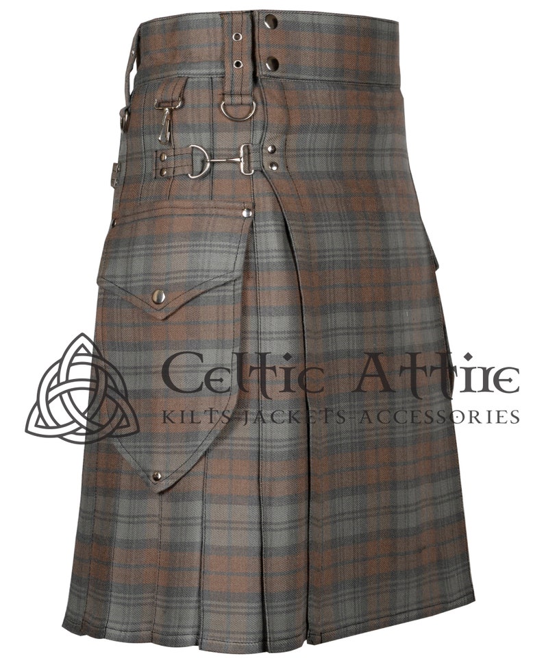 May include: A brown and gray plaid kilt with a leather strap and buckles. The kilt has a large cargo pocket on the front and a smaller pocket on the back. The kilt is made of a thick, durable fabric and is perfect for any occasion.
