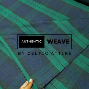 May include: Green and blue plaid fabric with the text "AUTHENTIC WEAVE BY CELTIC ATTIRE" printed on it.