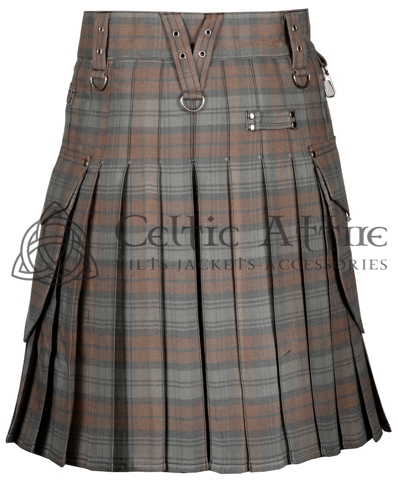 May include: A brown and gray plaid kilt with cargo pockets and a leather strap with metal buckles. The kilt has a Celtic Attire logo on the front.