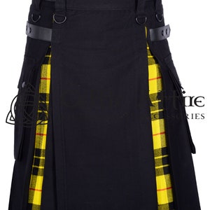 May include: Black utility kilt with yellow and red tartan accents. The kilt has a leather belt with buckles and D-rings.