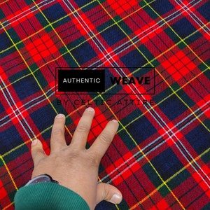 May include: Red, black, green and yellow tartan fabric with the text "AUTHENTIC WEAVE BY CELTIC ATTIRE" printed on it.