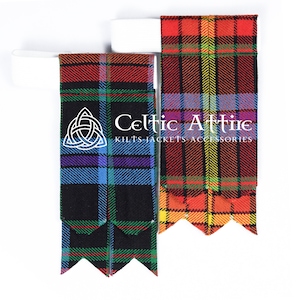 May include: Two pairs of kilt hose with a black background and colorful plaid patterns. The hose are made of a woven fabric and have a traditional Scottish design. The hose are displayed on a white background with the text "Celtic Attire Kilts Jackets Accessories" printed on the right side of the image.