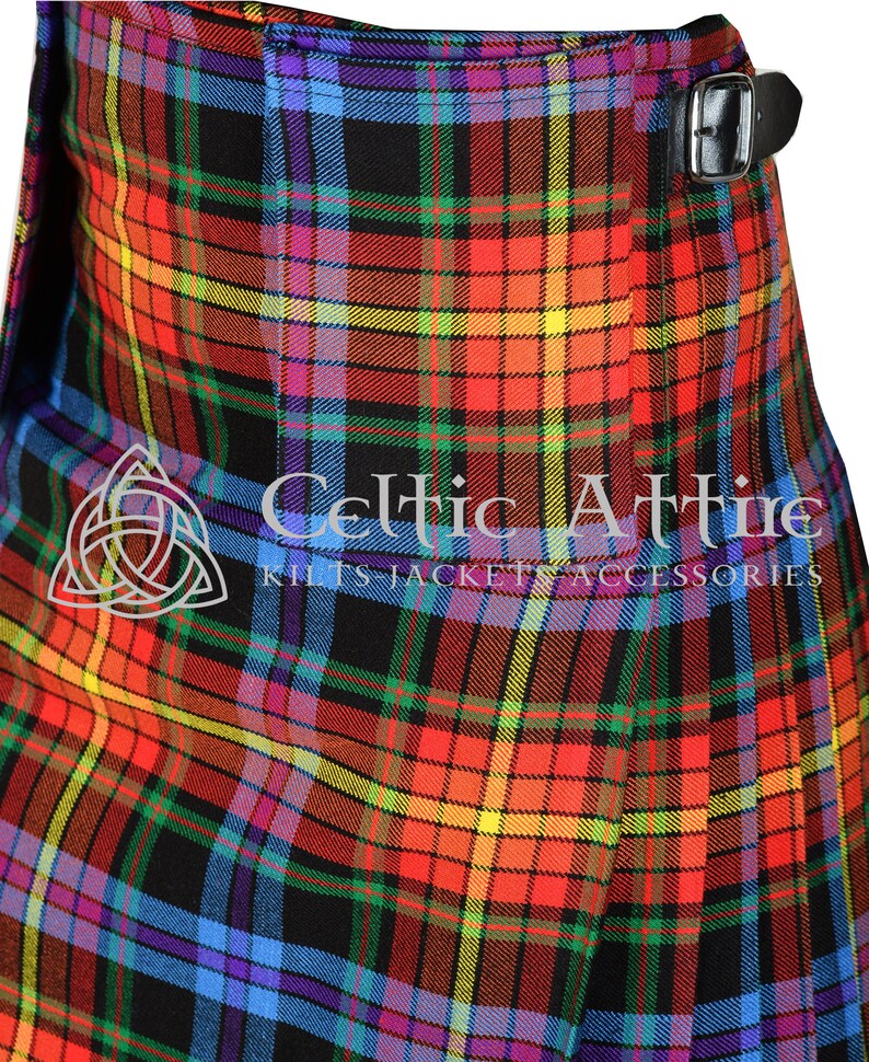 May include: A colorful kilt with a black background and a variety of colors including red, yellow, blue, and green. The kilt is made of a woven fabric and has a traditional plaid pattern. The kilt is worn with a black leather belt.