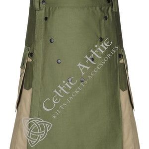 Op de afbeelding: Een groene en bruine utility kilt met meerdere zakken en zwarte knoopaccenten. De kilt heeft de tekst "Celtic Attire Kilts-Jackets-Accessories" op de voorkant.