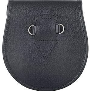 May include: A black leather sporran with a silver buckle and two silver rings.