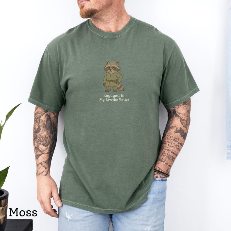 Cute illustrated couple matching engagement shirts with fantasy theme