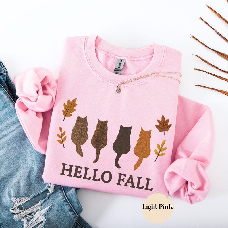 Thanksgiving and fall season cat shirt with cozy design.