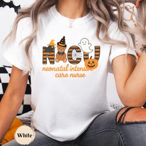 Spooky Season NICU Nurse T-Shirt, Neonatal Intensive Care Halloween Graphic Tee in White.