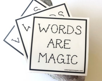 WORDS ARE MAGIC three-inch square sticker (white)