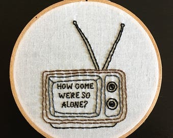 How come we're so alone? - Motion City Soundtrack lyric framed embroidered wall art