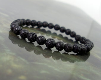 Bracelet en pierre de lave volcanique 6 mm, bracelet de pierres précieuses naturelles, bracelet de perles noires unisexe femme homme, cadeau pour elle, cadeau pour lui + sac cadeau