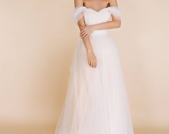 Unique Light Blush A Line Wedding Dress With Deep V-neck Sparkly