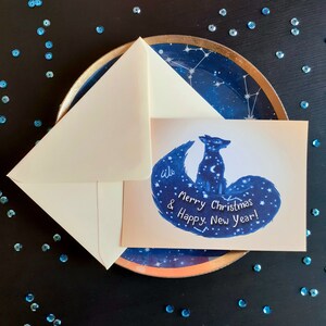 Kerstkaart, postkaart met envelop, nieuwjaarskaart, kerstwensen, feestelijke wensen, sterrenhemel, sterren, astrologie, vos illustratie