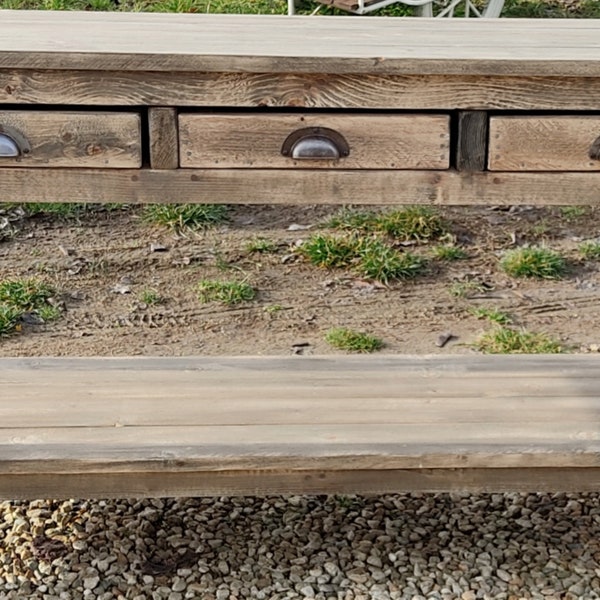 Mixed reclaimed wood counter unit with three drawers and antiqued silver iron handles