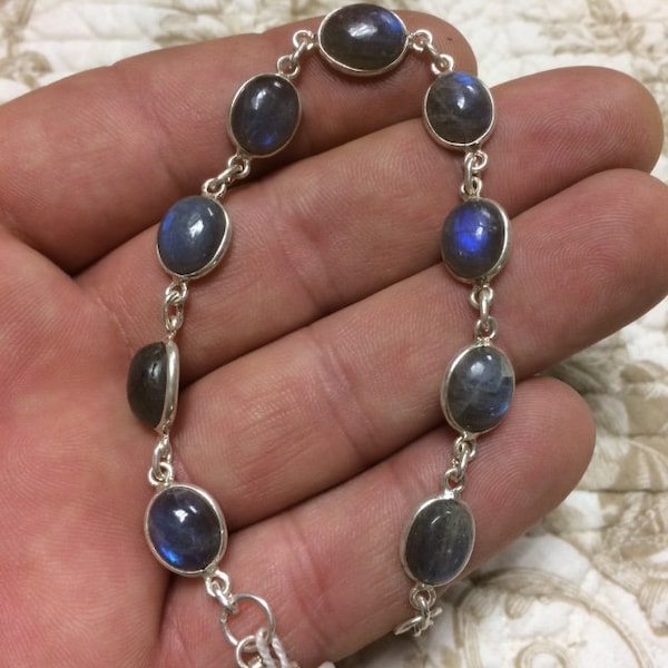 Magnifique bracelet de Labradorite, Argent 925, très belle qualité de pierre et de sertissage, réglable de 18 à 20cm. Bijoux pour la vie !!!