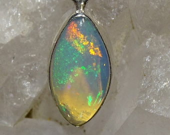 Welo/ Wolo opal pendant, natural multi fire, yellow, red, blue, green. Very good quality, sold alone or with a 42cm silver chain