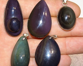 Celestial Eye Obsidian, hand-carved pendants, very beautiful quality finishes, very powerful, magical stones. The perfect gift