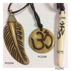 3 Ethnic pendants of your choice, cut and painted by hand, in natural bone. Om symbol, Feather, sold with adjustable black cords, Rare...
