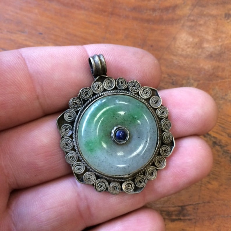 Very nice quality finish silver tone craft and traditional genuine semi precious stone! Selection of the Nepal pendants