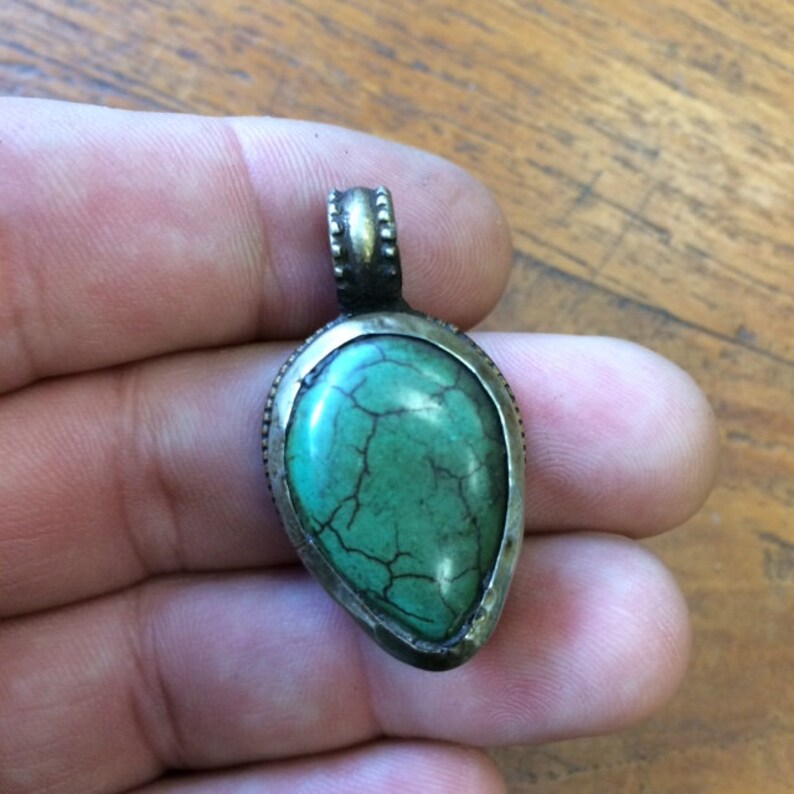 Very nice quality finish silver tone craft and traditional genuine semi precious stone! Selection of the Nepal pendants