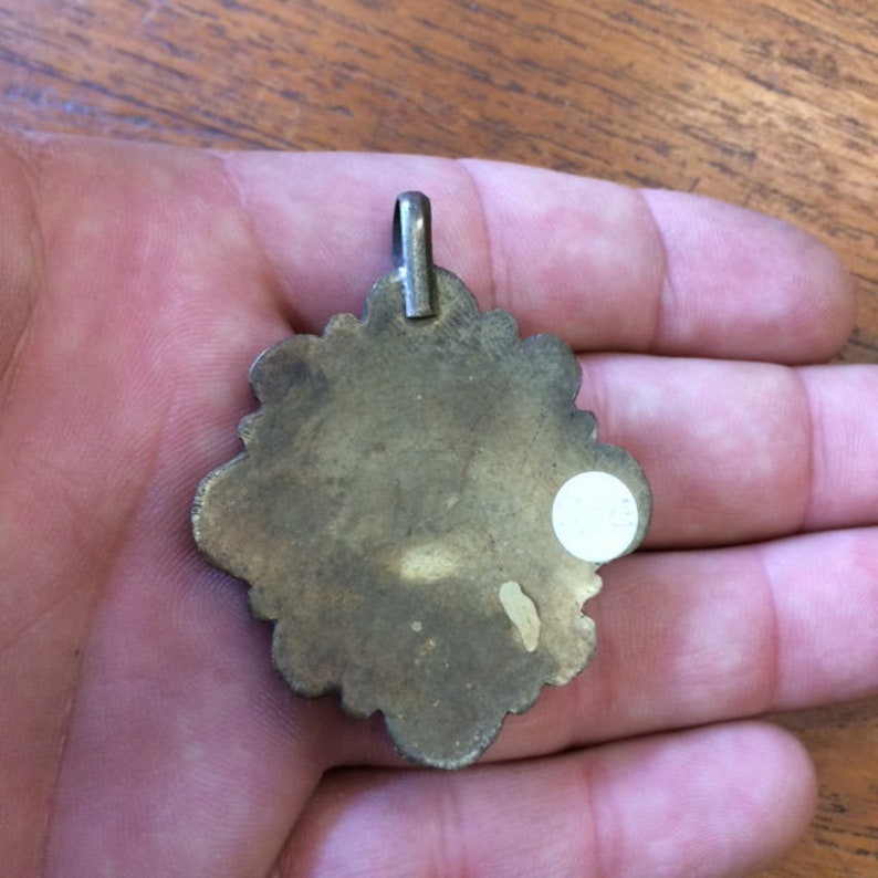 Very nice quality finish silver tone craft and traditional genuine semi precious stone! Selection of the Nepal pendants