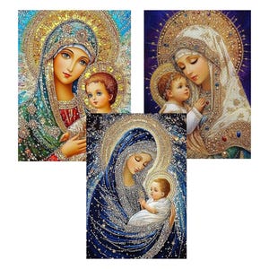 May include: Three religious art prints featuring the Virgin Mary and baby Jesus. The artwork showcases detailed depictions with halos, intricate clothing, and a serene color palette of blues, golds, and whites. The images are rich in detail and texture.