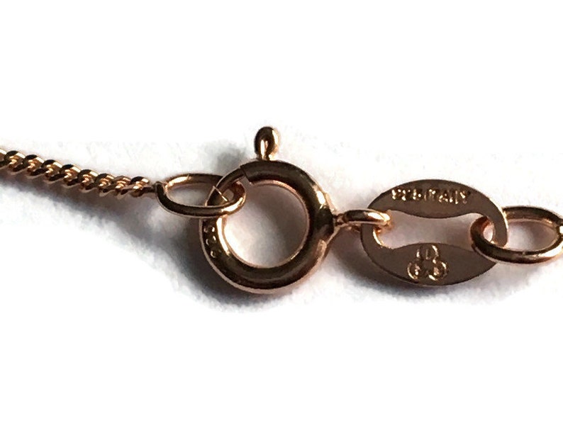 Angel wing and pearl pendant