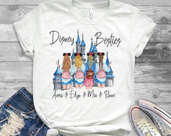 May include: White t-shirt featuring a graphic of four girls in front of the Disney castle. The text "Disney Besties" is above the graphic and the text "Averi & Edyn & Mia & Rinne" is below the graphic.