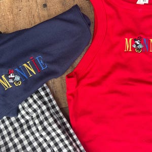 May include: A set of three ceramic mugs with a speckled, matte finish. The mugs are in shades of cream, light gray, and dark gray. Each mug has a simple, modern design and a rounded handle.