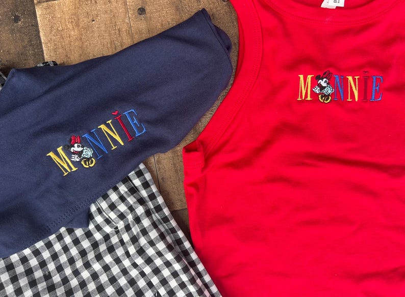 May include: A set of three ceramic mugs with a speckled, matte finish. The mugs are in shades of cream, light gray, and dark gray. Each mug has a simple, modern design and a rounded handle.