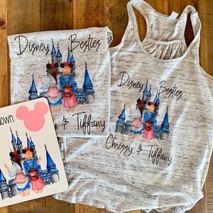 May include: Two white tank tops with a graphic of two women standing in front of a blue castle with the text "Disney Besties" and "Chrissy & Tiffany". A white square with a pink Mickey Mouse head and the text "Countdown:" and a graphic of two women standing in front of a blue castle.